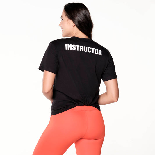We Move The World Instructor Tee